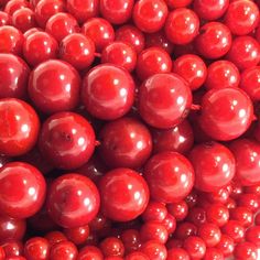 red cherries piled on top of each other