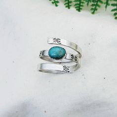 Oval Turquoise Wrap Ring - Silver Fern Handmade Unique Stamped Turquoise Ring, Silver Stamped Turquoise Ring Gift, Gift Silver Stamped Turquoise Ring, Unique Adjustable Stamped Turquoise Ring, Stamped Turquoise Rings For Gifts, Adjustable Stamped Turquoise Ring In Sterling Silver, Adjustable Stamped Sterling Silver Turquoise Ring, Bohemian Stamped Turquoise Ring Gift, Sterling Silver Stamped Turquoise Ring Gift