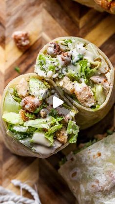 the wrap is filled with meat, lettuce and cheese