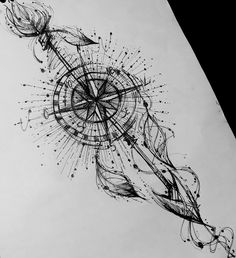 a drawing of a pen and ink on paper with an abstract design in the middle