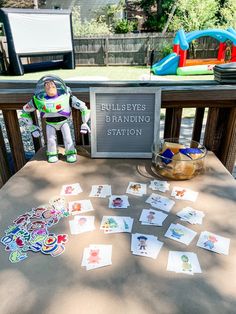 Buzz Lightyear guarding Bullseyes Tattoo Branding Station at a Toy Story themed birthday Toy Story Simple Party, Kids Games Birthday Party, Toy Story Party Game, Toy Story 3rd Birthday Party Girl, Reach Four The Sky Birthday Toy Story, Toy Story Three Birthday, Simple Toy Story Party, Two Story Birthday Party, Toy Story Two Birthday