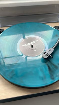 a turntable with a record player attached to it