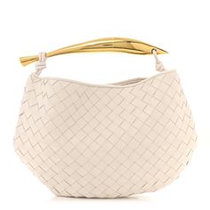 This is an authentic BOTTEGA VENETA Nappa Intrecciato Sardine Bag in Chalk. This stylish shoulder bag is crafted of intrecciato tightly woven white lambskin leather. The bag features a gold sardine shaped top handle. The open top leads to a matching woven leather interior. Elegant Handheld Shoulder Bag With Intrecciato Weave, White Formal Top Handle Hobo Bag, White Top Handle Hobo Bag For Formal Occasions, Formal White Top Handle Hobo Bag, White Top Handle Hobo Bag, Elegant Hobo Bag With Braided Handles, Designer White Hobo Bag For Shopping, Formal White Hobo Tote Bag, White Shoulder Bag With Round Handle For Formal Occasions