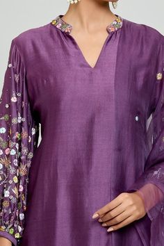 Violet straight kurta featuring resham, sequin, cutdana, and floral motif embroidered sleeves and neckline. Paired with a straight pant and embroidered dupatta with tassel detailing. - Aza Fashions Silk Kurta With Sequins In Traditional Drape, Silk Kurta With Sequins For Festivals, Fitted Silk Kurta With Sequins, Traditional Purple Sequined Blouse Piece, Kurta Pant Set, Women Kurta, Embroidered Sleeves, Embroidered Dupatta, Straight Kurta