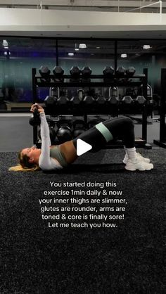 a woman is doing exercises in the gym