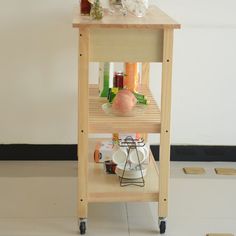 a wooden shelf with drinks and condiments sitting on it's side table