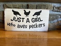 a sign that says, just a girl who loves peckers