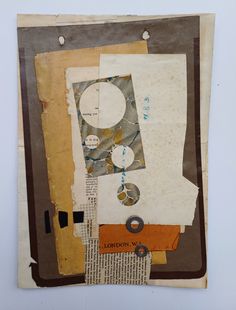 a piece of paper with circles and other things on it that are collaged together