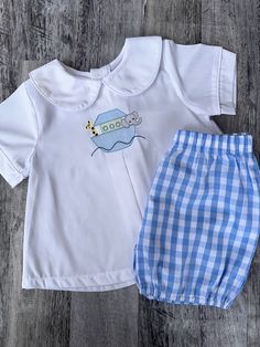 How precious is this sweet, embroidered Peter pan collared shirt and bloomer set? It is classic and simple; I have embroidered Noah's Ark in the center and can put the name on the collar.  If you would like to customize your shirt such, I can add a name or initials to the collar. Cute Fitted Gingham Sets, Classic Collared Sets For Spring, Classic Spring Sets With Collared Shape, Fitted Gingham Sets For Spring, Preppy Cotton Sets For Spring, Preppy Fitted Cotton Sets, Preppy Cotton Spring Sets, Spring Preppy Cotton Sets, Gingham Cotton Short Sleeve Set