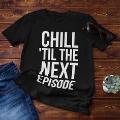 Unleash your inner chill with our rap-themed unisex shirt! Featuring the iconic phrase 'Chill Til The Next Episode', this shirt is perfect for anyone who loves to kick back and relax. Show off your love for laid-back vibes with this must-have addition to your wardrobe. Get yours now! .: 100% Airlume combed and ringspun cotton  .: Light fabric (4.2 oz/yd² (142 g/m .: Retail fit .: Tear away label .: Runs true to size Product Title: Hip Hop Legends, Chill Til The Next Episode Unisex Tee, 90s Hip Hop, Hip Hop Gifts, Streetwear Clothing, Gift For Him, Father's Day Gift Cool Slogan Tops With Relaxed Fit, Cool Relaxed Fit Slogan Tops, Pop Culture Slogan Tops With Relaxed Fit, Relaxed Fit Slogan Tops For Pop Culture, Cool Relaxed Fit T-shirt With Funny Print, Cotton Tops With Funny Texts In Pop Culture Style, Cotton Tops With Funny Text In Pop Culture Style, Hip Hop Legends, 90s Hip Hop