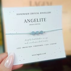 Angelite Dainty Bracelet  ⭐ Angelite 6mm beads ⭐ Glass beads ⭐ 100% Natural Silk Cord  Adjustable and universal size  Unique design and thoughtful gift idea 💌 Professionally handmade with care and love. Your bracelet will come with eco-friendly packaging ready for gifting.  Free UK delivery Angel Crystal, Handmade Crystal Jewelry, Crystal Angels, Dainty Bracelet, Silk Cord, Dainty Bracelets, Jewellery Gift, Natural Silk, Hard Time