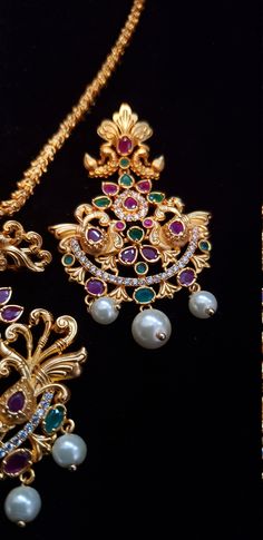 "Handmade Indian Temple Jewelry, best to wear it for traditional ceremonies or Indian wedding. This bridal jewelry has ethnic finish. It has Cubic Zircon stones with ruby and emeralds. It is a Bollywood style one gram jewelry. There are long and short patterns of Indian jewelry in Kundan, Pearls, CZ, American Diamond , ruby, emerald, Polki, kemp to suit every occasion of South Indian and North Indian weddings. Handmade Indian Jewelry item * Stunning Hand made matt finish traditional jewelry set. Festive Temple Necklace With Stone Setting For Wedding, Festive Wedding Temple Necklace With Stone Setting, Traditional Jeweled Kundan Necklace For Ceremonial Occasions, Peacock Design Pendant Jewelry For Wedding, Wedding Necklaces With Stone Setting For Festivals, Wedding Kundan Necklace Pendant With Peacock Design, Wedding Kundan Pendant Necklace With Peacock Design, Wedding Kundan Peacock Pendant Necklace, Wedding Chandbali Necklace With Stone Setting