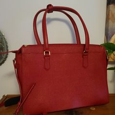 Beautiful Never Used Tumi Laptop Briefcase. Red In Color With Detachable Shoulder Straps. Zipper Closure, Many Pockets, 10x15x5. Red Business Shoulder Bag With Adjustable Strap, Red Business Bag With Adjustable Strap, Red Satchel With Zipper For Office, Red Satchel With Zipper Closure For Office, Red Office Satchel With Zipper Closure, Red Double Handle Satchel For Business, Red Satchel With Adjustable Handle For Everyday, Everyday Red Satchel With Adjustable Handle, Red Crossbody Satchel For Business