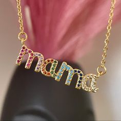 Your Mom Will Love This Stunning Multicolored Mama Necklace. This Timeless, Dainty Piece Can Be Worn Everyday On Its Own, Or Paired With Other Necklaces To Create A Trendy Layered Look. Mother’s Day Is May 9. Stainless Steel Pendant Is 1.25” Wide, .35” Tall With 18.8” Long Chain With Lobster Clasp And Chain Extension For Adjustable Length. Only 5 Available! Multicolor Jewelry For Mother's Day Party, Multicolor Necklaces For Mother's Day Birthday, Multicolor Necklace For Birthday And Mother's Day, Multicolor Jewelry Gift For Mom, Mama Necklace, Stainless Steel Pendant, Your Mom, Steel Necklace, Long Chain