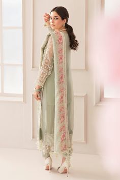 Embroidered Green Pakistani Party Dress in Chiffon fabric can be customized to a shirt style or Gown style. Floral designs and threads make this Pakistani Party Wear a masterpiece. Detailed Description: SKU: PS2477 Detailing: Embroidery, Threads, Tilla, Zari Color: Light green Fabric: Chiffon, Organza, Raw silk Design: Fully Embellished Dress with Embroidery, Floral designs Event: Party wear, Wedding