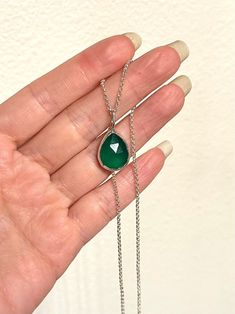 Details: ☆ Gemstone- AAA High quality Natural Green Onyx, faceted teardrop shape, 15mm ☆ Closure- 925 Sterling Silver, 6mm, a spring ring clasp  ☆ Chain- 925 Sterling Silver, rolo chain The necklace length is 18". This beautiful necklace has been made very carefully with lots of love and care.  A perfect gift for someone special or yourself. Healing and protection stone: Onyx is a stone that offers up powerful vibrations of protection, strength, focus and willpower. This stone is here to continuously push you forward in your life.  Onyx treats disorders of the bones, bone marrow and blood. It is beneficial for teeth and the feet. Luxury Green Onyx Jewelry For Gift, Luxury Green Onyx Jewelry For May Birthstone, Luxury Elegant Green Onyx Necklace, Luxury Green Onyx Gemstone Necklace, Luxury Green Onyx Necklace, Green Onyx Necklace, Onyx Pendant, Onyx Necklace, Protection Stones