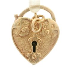 Vintage 9CT, Love Lock, 4.8g - Carat- 9CT - Weight - 4.8g - Colour - Yellow Gold - Design - A lovelock padlock. - Size - 2.4cm x 2cm A lovely little vintage charm that would look lovely on a chain or a pendant. Please note that the lock has been welded shut so it does not open. 12 Month Warranty Included with ourselves. Free Postage, Collection also Available from our secure retail store in Bristol. The pictures shown in the listing are pictures of the actual item (Please feel free to Message us with any questions)     i-13181(Our stock reference)    ---------------------------------------------------------------------------------------------------------------- Bristol Gold LTD was established in 2011. We specialise in preowned Watches, Jewellery and Diamonds. We are a small family run com Vintage Padlock, Stock Reference, Love Lock, Times New Roman, Colour Yellow, Small Family, Font Styles, Gold Design, Retail Store