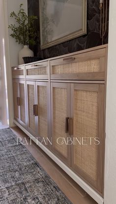 the sideboard is made out of wood and has rattan panels on it's doors