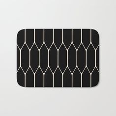 black and white geometric pattern bath mat