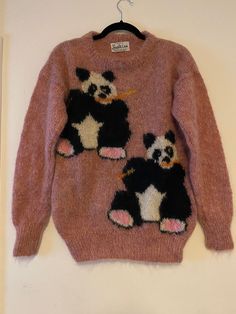 "Vintage 1980s mohair sweater by Susie Lee. Hand knitted in Kent, England. The sweater has two pandas covering the front and back. Long sleeves.  - Era: 1980s - Fits Like: Small/Medium - Fabric: 78 % mohair / 13% wool / 9% nylon - Brand: Susie Lee - Bust: 38\" - Waist: 30\"  - Length front: 26\" - Sleeve length: 21\" - Condition: new (40 years old but never worn) - Smells/Odors: none Note: All measurements are taken while the garment is lying flat, bust and waist measurements are then doubled. A Two Pandas, Purple Cottagecore, Blue Cottagecore, Kent England, Sweater Crop, L And Light, Mohair Sweater, Women Pullover, 40 Years