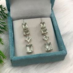 This Earring is made from 925 sterling silver. This Drop & Dangle Earring is finely polished to give a brilliant mirror finish. With rejuvenating design and sleek appearance, this Earrings looks stunning on Ear Materials:- 925 Sterling Silver Gemstone:- Natural Green Amethyst Item Weight :-6.30 Grams Approx. Stone Size :- 7 x 9 & 5 x 7 MM Octagon & 5 MM Square Stone Shape:- Octagon Cut & Square Cut For Matching Ring Visit:- https://www.etsy.com/in-en/listing/1555740112/ https://www.etsy.com/in-en/listing/1563981199/ https://www.etsy.com/in-en/listing/1538694788/ For Matching Pendant Visit:- https://www.etsy.com/in-en/listing/1439182379/ https://www.etsy.com/in-en/listing/1439114601/ Payment Policy We accept payment through PayPal. All payments must be made within 7 days of purchase. If you Silver Sterling Silver Gemstones With Matching Earrings, Elegant Silver Jewelry With Green Amethyst, Fine Jewelry Silver Faceted Earrings, Silver Faceted Fine Jewelry Earrings, Sterling Silver Gemstones With Matching Earrings, Silver Jewelry With Green Amethyst For Gift, Faceted Silver Fine Jewelry Earrings, Elegant Nickel-free Silver Gemstones, Elegant Green Amethyst Earrings For Gift