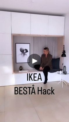 a man sitting in a chair with the words ikea besta hack