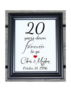 a framed sign with the words 30 years down forever to go, and a heart on it