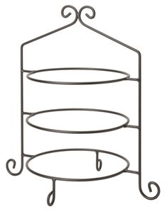 a metal rack with two round plates on the top and one oval plate on the bottom