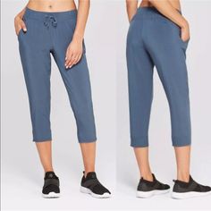 C9 By Champion Women's Plus Size Woven Activewear Jogger Mid-Rise Capri Features: Duo Dry (Wicks Moisture + Dries Fast) Stretch & Has 2 Side Pockets And 1 Back Ribbing On The Back Portion Of The Hem Size: Xxl (Measurements Are Approximately) Waist: 40 Inches Inseam: 22 Inches Color: Blue Gray Condition: Brand New With Tag. Brand Label Has Been Marked Through. Casual Summer Sports Capris, Spring Casual Gym Capris, Blue Mid-rise Relaxed Fit Capris, Casual Spring Gym Capris, Casual Spring Capris For Gym, Blue Workout Capri Bottoms, Blue Capri Workout Bottoms, Casual Moisture-wicking Capris For Gym, Casual Moisture-wicking Capris For Workout