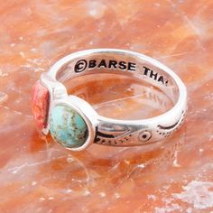 This beautiful Turquoise and Coral Duo Ring is the perfect accessory for any outfit! Crafted by hand and detailed with an intricate etched design, this ring features real turquoise and sponge coral set in polished sterling silver bezels for an exquisite touch of color. 💍✨ Stamped Turquoise Rings For Gifts, Southwestern Style Engraved Turquoise Ring As Gift, Engraved Southwestern Style Turquoise Ring For Gift, Adjustable Stamped Sterling Silver Turquoise Ring, Adjustable Stamped Turquoise Ring In Sterling Silver, Sterling Silver Stamped Turquoise Ring Gift, Bohemian Engraved Turquoise Ring In Sterling Silver, Gift Turquoise Sterling Silver Ring, Southwestern Style Stamped Turquoise Ring As Gift