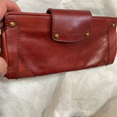 Cole Haan Leather Clutch Bag New With Tags $175.00 Vintage Color Is Brick Burgundy Color Measurements Are Given In Photos All Photos Are Part Of The Description Designer Leather Clutch For Everyday Use, Chic Red Leather Wallets, Leather Clutch With Snap Closure For Formal Occasions, Leather Clutch With Snap Closure For Formal Events, Chic Leather Bifold Bags, Formal Leather Clutch With Snap Closure, Chic Bifold Leather Bag, Vintage Leather Crossbody Clutch, Designer Leather Shoulder Bag With Coin Pocket