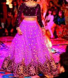 Purple Lehnga choli and dupatta can be customized into any color & style. If you would like the top to be longer reach out to us. Semi-stitched Lehenga With Resham Embroidery For Festival, Traditional Purple Choli With Dori Work, Purple Dola Silk Lehenga With Gota Work, Purple Lehenga With Gota Work In Dola Silk, Traditional Purple Lehenga With Dori Work, Purple Anarkali Choli For Festivals, Navratri Purple Choli With Resham Embroidery, Purple Resham Embroidered Choli For Navratri, Purple Resham Embroidery Choli For Navratri