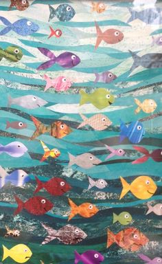 an ocean scene with many different colored fish