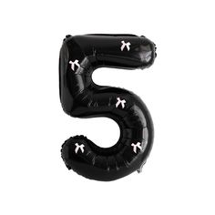 the number five is made out of black balloons