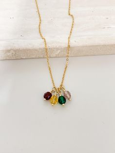 A beautiful birthstone necklace for Grandma, Mom, Nana, Aunt, or Mimi. Please choose your desired length and the number of birthstones from the drop down menu.  *Please note: The number of birth months that you note in the personalized box must equal the number that you chose from the drop down menu*  Details  *6mm birthstones *18k gold stainless steel  * dainty cable chain  *Items do not come in a gift box. *All items are customized and cannot be returned or exchanged. *Items ship Monday-Friday Mother's Day Gold Birthstone Necklace, Gold Tarnish-resistant Birthstone Necklace Gift, Gold 14k Gold-filled Birthstone Necklace For Gift, Customizable Birthstone Necklace For Mom - Valentine's Day Gift, Grandma Necklace Birthstone, Grandma Necklace, Necklace For Mom, Month Gifts, Gift For Grandma