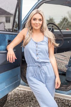 Country Core Jumpsuit – Four Sisters Boutique Casual Denim Overall Jumpsuit For Loungewear, Casual Spring Denim Jumpsuit For Loungewear, Casual Washed Blue Jumpsuits And Rompers For Spring, Casual Washed Blue Jumpsuits For Spring, Summer Washed Blue Jumpsuits And Rompers, Summer Light Wash Overalls With Button Closure, Summer Cotton Denim Jumpsuit For Loungewear, Cotton Denim Jumpsuit For Summer Loungewear, Casual Denim Jumpsuit For Summer Loungewear