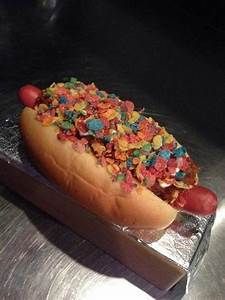 a hot dog covered in confetti and sprinkles