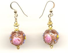 "Vintage Italian Wedding Cake Beads, Crystal Clear Fiorato, Murano Glass Earrings, handmade with 14mm Round, Venetian Beads. These detailed Italian, lamp worked beads are made with crystal clear colored Murano glass, Aventurina (copper), pink \"roses\", and blue and yellow \"forget-me-knots\". Some people refer to these beads as \"wedding cake\" beads; but the Italians call these beads \"Fiorato\" (flowered). I refer to them as Antique Fiorato. The crystal clear dangle earrings are shown in the Gold Round Beads Earrings For Wedding, Gold Earrings With Round Beads For Wedding, Adjustable Gold Beaded Earrings With Large Beads, Elegant Round Beaded Earrings With Spacer Beads, Gold Elegant Beaded Earrings With Large Beads, Gold Round Beaded Earrings With Spacer Beads, Elegant Gold Beaded Earrings With Large Beads, Gold Beaded Round Earrings, Gold Beaded Earrings With Round Beads For Wedding