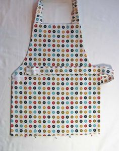 an apron made out of polka dot fabric