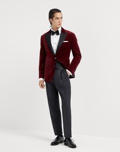 Cotton velvet tuxedo jacket with peak lapels Brunello Cucinelli style interprets the iconic elegance of the tuxedo in a contemporary way. A timeless, casual-inspired fabric, cotton velvet enhances the season’s colors and creates an elegant material contrast with the glossy effect of the silk and cotton satin used for the peak lapel and trim. The construction of the jacket follows the fit that distinguishes the style of the Menswear collections, fitted in the chest with slightly pronounced should Luxury Velvet Blazer, Luxury Single-breasted Velvet Suit, Luxury Velvet Single-breasted Suit, Luxury Velvet Blazer With Notch Lapel, Luxury Red Tuxedo, Luxury Red Blazer For Formal Occasions, Red Luxury Blazer For Formal Occasions, Luxury Red Formal Blazer, Classic Formal Velvet Outerwear