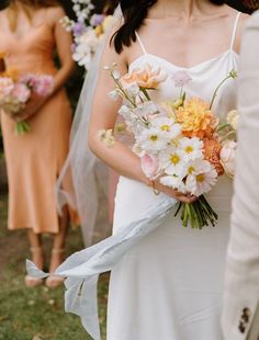 Autumnal wedding flowers by @tremellabotanicals. Dancing bouquets of sunshine with a flowy silk ribbon – a colour palette of peaches, pinks, oranges, yellows, whites and a hint of powder blue and lilac. Photography by Elsa Campbell. #tremellabotanicals #nofloralfoam Autumnal Wedding Flowers, Lilac Photography, Autumn Wedding Bouquet, Orange Wedding Bouquet, Wedding Bridesmaid Bouquets, Yellow Wedding Bouquet, Peach Bridesmaid Dresses, Autumnal Wedding, Orange Bouquets