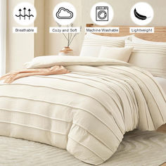 an image of a bed with white comforter and pillows