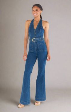 Step out in style with the Fort Worth Jumpsuit! This playful and stretchy denim jumpsuit features a flattering bootcut design and a trendy belt with gold hardware. Perfect for any occasion, this jumpsuit will have you turning heads and feeling... Chic Medium Wash Overall Jumpsuits And Rompers, Fitted Blue Denim Jumpsuit With Belt, Fitted Jumpsuits And Rompers With Belt For Spring, Chic Fitted Denim Jumpsuit For Night Out, Chic Fitted Denim Jumpsuit Overall, Chic Fitted Denim Jumpsuit, Fitted Jumpsuits With Belt For Spring, Chic High-waist Denim Blue Overalls, Chic Denim Jumpsuits And Rompers For Night Out