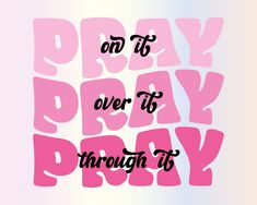 the words pray over it through its pink and blue background with black lettering on top