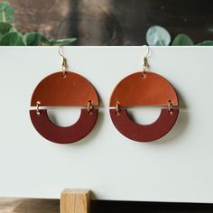 All the fun of big, bold geometric earrings with none of the weight! the Details ﻿- 3" drop x 2" W Modern Handmade Hoop Earrings, Trendy Leather Earrings For Everyday, Modern Orange Earrings For Everyday Wear, Handmade Leather Everyday Earrings, Square Leather Earrings, Bold Drop Earrings With Bold Design, Geometric Leather Earrings, Bold Geometric Earrings, Bold Geometric Earrings With Bold Design