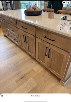 a kitchen island with two bowls on it