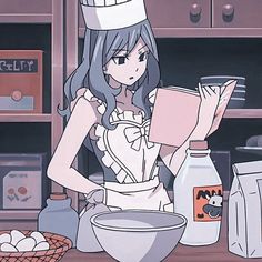 a woman in a chef's hat is making some kind of food on the counter