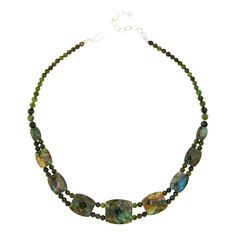 Jay King Nephrite Jade and Labradorite Reversible Necklace Gorgeous green nephrite jade and lovely labradorite together create a fun styling option with two unique looks in one versatile design. Simply reverse the necklace to change up your look! From Jay King.       Approx. 18"L x 15/16"W with 2-3/4" extender     Stamped .925     Hook closure     Dark green nephrite jade necklace has nine double-sided, barrel-shaped, faceted stations along drape     Each station has multicolor labradorite on on Green Gemstone Jewelry With Labradorite, Green Labradorite Necklaces With Natural Stones, Unique Looks, Nephrite Jade, Jade Necklace, Boho Jewelry, Labradorite, Dark Green, Jay