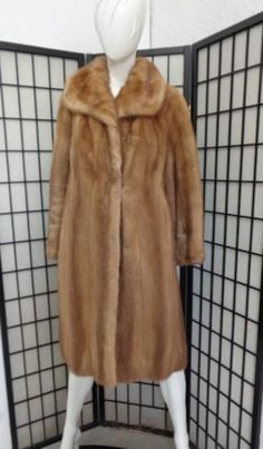 DESCRIPTION: BEAUTIFUL & VERY STYLISH PASTEL MINK FUR COAT FOR WOMEN. THE COLLAR TYPE IS "SHAWL" AND IT CLOSES WITH HOOK & EYE AND HAS TWO SIDE POCKETS. THIS ITEM IS PRE-OWNED: THE FUR AND INSIDE LINING ARE "MINT", THE SECOND BEST CONDITION POSSIBLE! AFTER BUYING THIS ITEM, IT WOULD BE VERY MUCH APPRECIATED IF YOU COULD PROVIDE YOUR HEIGHT, WEIGHT AND BUST CIRCUMFERENCE, SO WE CAN ADJUST THE COAT TO YOUR SIZE, BEFORE SHIPPING, IF NEEDED. IT WILL ALSO HELP US TO SHIP YOUR ITEM SOONER, THANK YOU! Elegant Full-length Outerwear For Fall, Elegant Full Length Outerwear For Fall, Classic Long Fur Coat For Formal Occasions, Formal Long Sleeve Fur Coat For Winter, Classic Formal Fur Coat For Fall, Elegant Long Mink Outerwear, Classic Long Fur Coat For Fall, Classic Mink-colored Formal Outerwear, Classic Fur Coat For Work In Fall