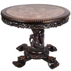 an ornately decorated table with carvings on it